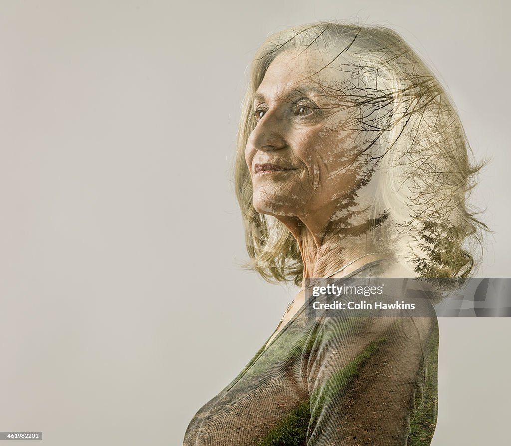 Senior female portrait with rural track overlay