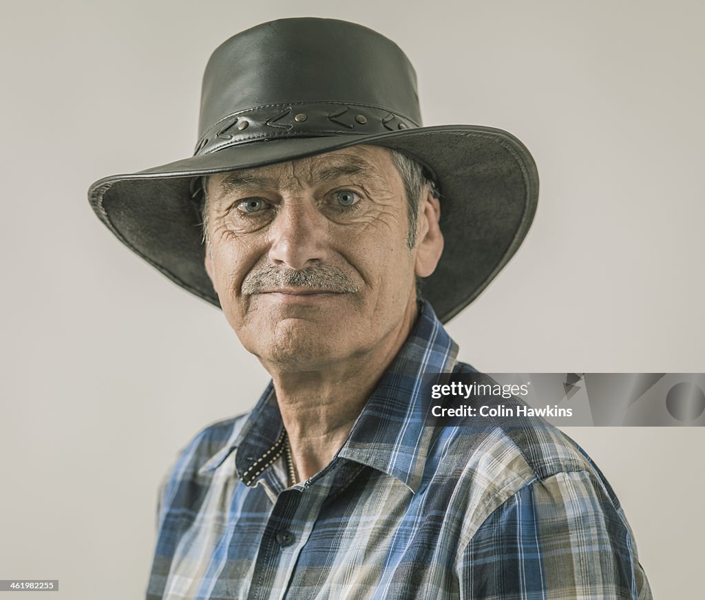 Senior male portraitwith cowboy hat