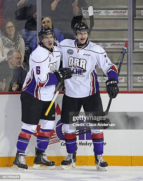 Ryan Pilon of Team Orr celebrates his goal with teammate Paul Bittner against Team Cherry in the 2015 BMO CHL/NHL Top Prospects game at the Meridian...