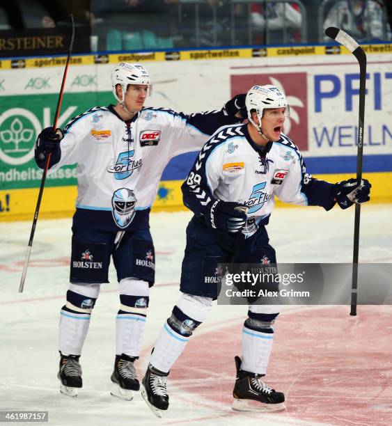 David Wolf of Hamburg celebrates his team's second goal during the DEL match between Adler Mannheim and Hamburg Freezers at SAP Arena on January 12,...