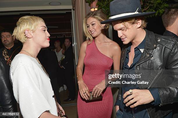 Recording artist Miley Cyrus, honoree Gigi Hadid and singer Cody Simpson attend The DAILY FRONT ROW "Fashion Los Angeles Awards" Show at Sunset Tower...