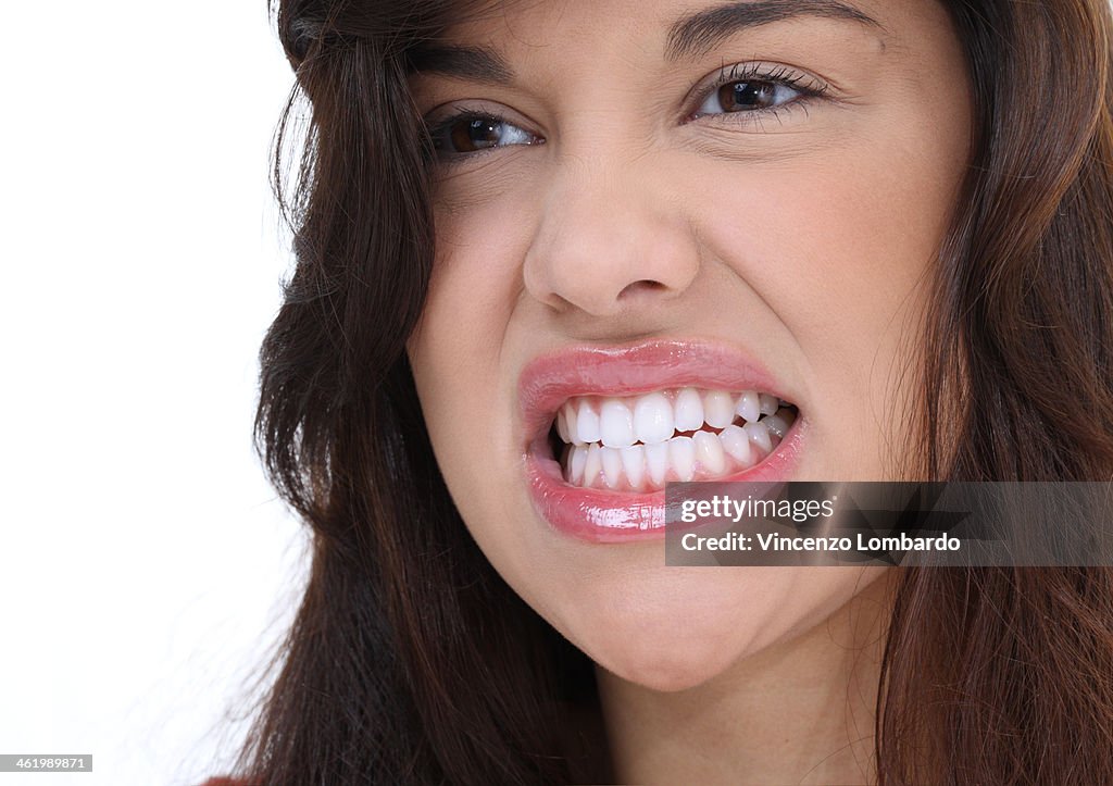 Woman clenching teeth