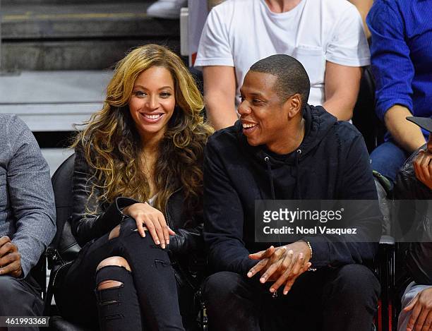 Beyonce and Jay Z attend a basketball game between the Brooklyn Nets and the Los Angeles Clippers at Staples Center on January 22, 2015 in Los...
