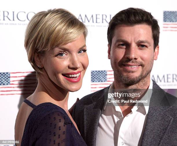 Actress Ashley Scott and her husband Steve Hart attend the Los Angeles screening of "Americons" at ArcLight Cinemas on January 22, 2015 in Hollywood,...