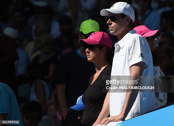 Sweden's Stefan Edberg, coach to Switzerland's Roger Federer and Mirka Federer, Federer's wife, look on during his men's singles match against...