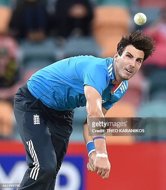 England's Steve Finn bowls during the one-day international cricket match between Australia and England at Bellerive Oval in Hobart on January 23,...