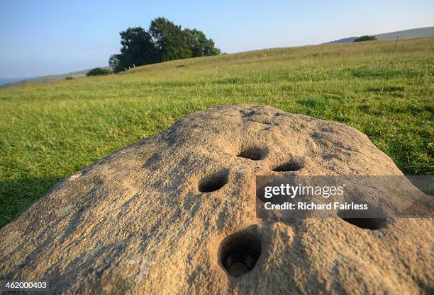 eyam boundary stone money holes - eyam derbyshire stock pictures, royalty-free photos & images