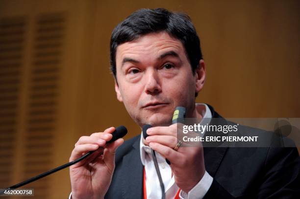 France's influential economist Thomas Piketty, author of the bestseller "Capital in the 21st Century" addresses a keynote speech during a symposium...