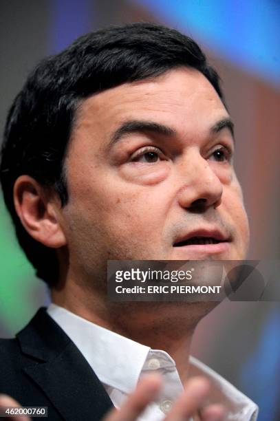 France's influential economist Thomas Piketty, author of the bestseller "Capital in the 21st Century" addresses a keynote speech during a symposium...