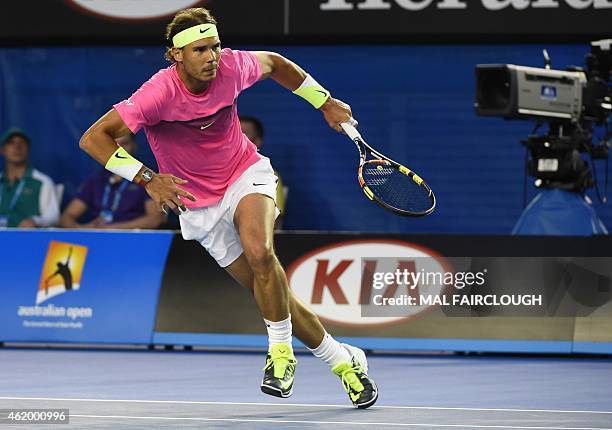 Spain's Rafael Nadal runs across the court during his men's singles match against Israel's Dudi Sela on day five of the 2015 Australian Open tennis...