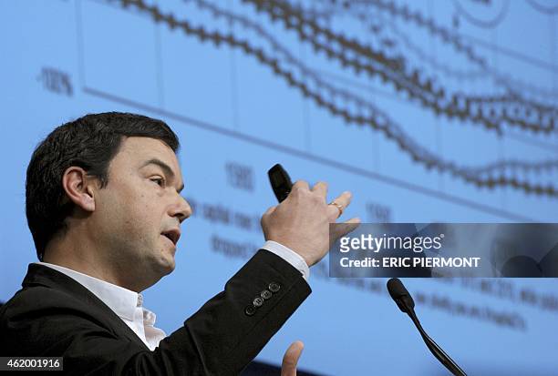 France's influential economist Thomas Piketty, author of the bestseller "Capital in the 21st Century" addresses a keynote speech during a symposium...