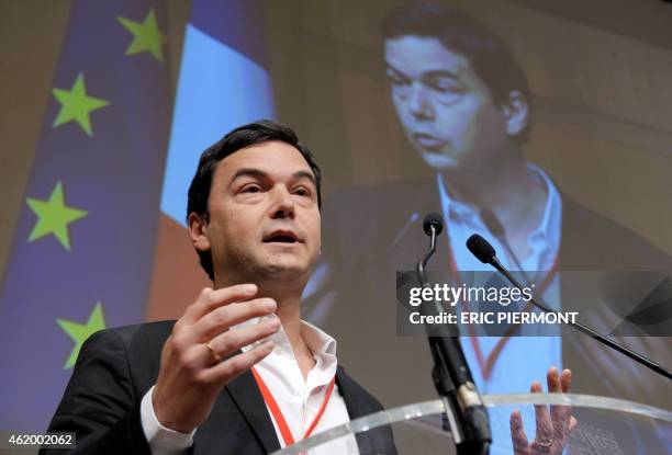 France's influential economist Thomas Piketty, author of the bestseller "Capital in the 21st Century" addresses a keynote speech during a symposium...