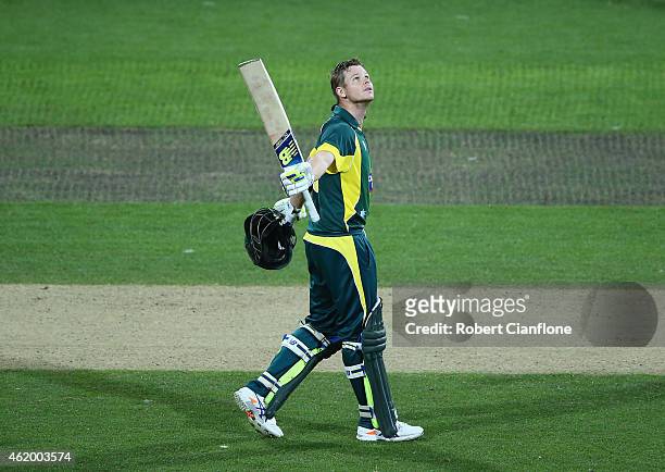 Steve Smith of Australia celebrates after reaching his century during the One Day International Tri Series match between Australia and England at...
