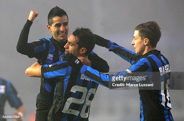 Maximiliano Moralez of Atalanta BC celebrates his goal with his team-mates Davide Brivio and Daniele Baselli during the Serie A match between...
