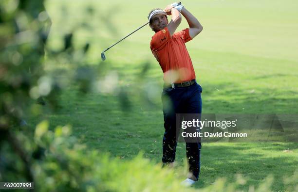 Joost Luiten of The Netherlands plays his second shot at the par 4, 16th hole during the final round of the 2014 Volvo Golf Champions at Durban...