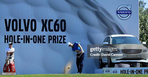 Tommy Fleetwood of England plays his tee shot on the par 3, 12th hole during the final round of the 2014 Volvo Golf Champions at Durban Country Club...