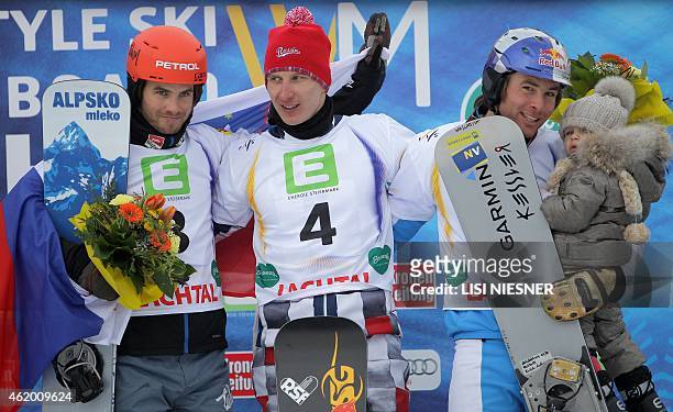 First placed Russia's Andrey Sobolev , second placed Slovenia's Zan Kosir and third placed Austria's Benjamin Karl with his daughter celebrate on the...