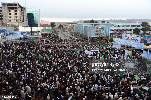 Afghan demonstrators chant slogans and hold banners that read "Muhammad" during a protest against the printing of satirical sketches of the Prophet...