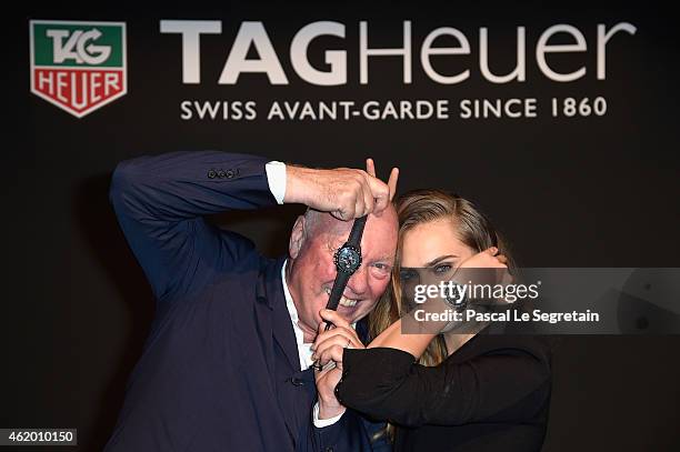 Model Cara Delevingne poses with Jean-Claude Biver as she joins TAG Heuer as Brand Ambassador to launch the new 2015 campaign at Palais des...