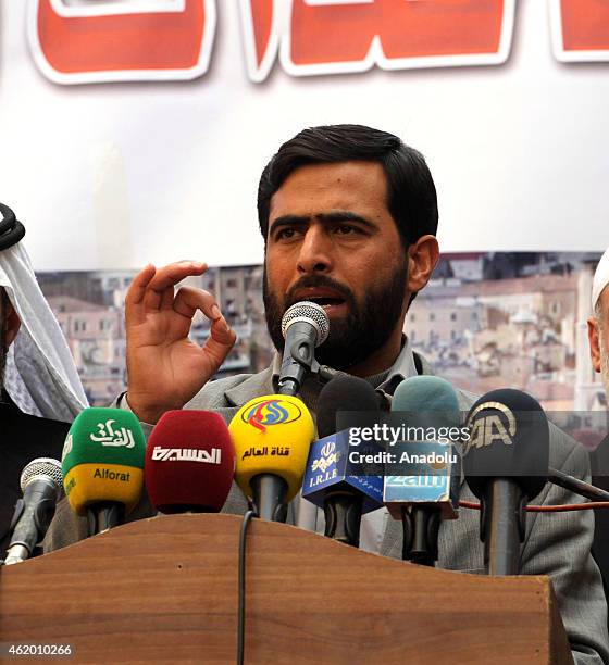 Mushir al-Masri one of Hamas leaders speaks during a protest in Jabalia region of Gaza City, Gaza on January 23, 2015 against the printing of...