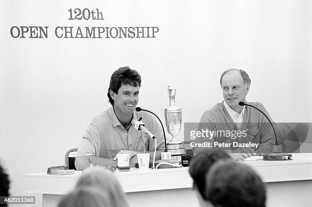 Ian Baker-Finch of Australia talks to the press with the Claret Jug watched by David Begg the R&A press Officer during the 120th Open Championship...
