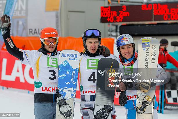 Zan Kosir of Slovenia takes 2nd place, Andrey Sobolev of Russia takes 1st place, Benjamin Karl of Austria takes 3rd place during the FIS Snowboard...