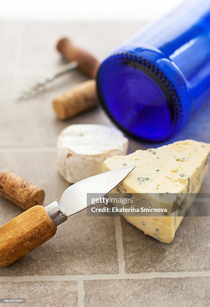 Blue cheese with knife on the table