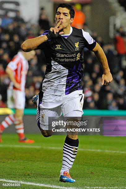 Liverpool's Uruguayan forward Luis Suárez celebrates after scoring his team's second goal during the English Premier League football match between...