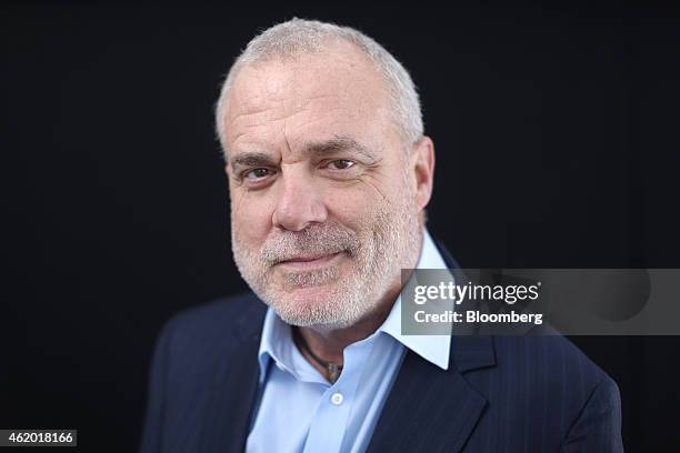 Mark Bertolini, chief executive officer of Aetna Inc., poses for a photograph following a Bloomberg Television interview on day three of the World...