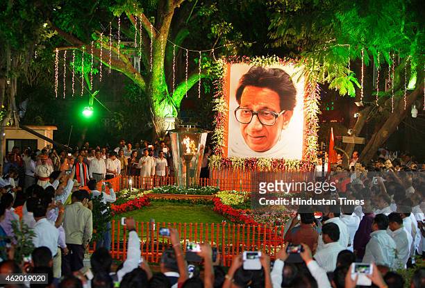 Shiv Sena Chief Uddhav Thackeray with his wife Rashmi Thackeray and son Aditya Thackeray inaugurate firelight at Shivaji Park on the occasion of Late...