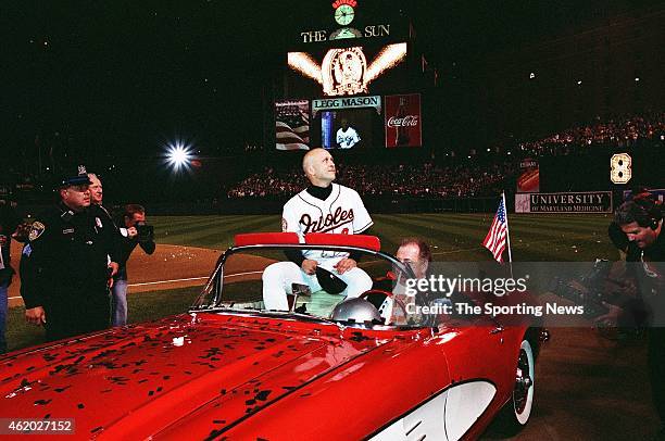 Cal Ripken of the Baltimore Orioles acknowledges the crowd against the Boston Red Sox at Oriole Park at Camden Yards on October 6, 2001 in Baltimore,...