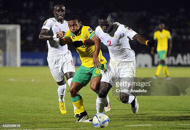 South Africa's Thuso Phala vies for ball with Senegal's Serigne Kara Mbodji and Sadio Mane during the 2015 African Cup of Nations Group C football...