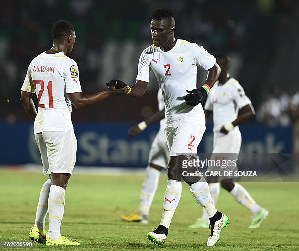 Senegal's defender Kara Mbodji celebrates after scoring a goal during the 2015 African Cup of Nations group C football match between South Africa and...