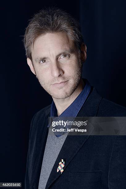 Director Damian Szifron from "Wild Tales" wears a pin to support #TackleEbola in a portrait at the Village at the Lift Presented by McDonald's McCafe...