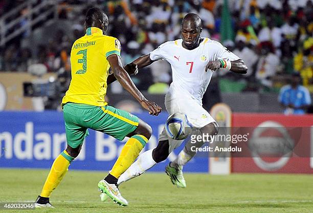 South Africa's Eric Mathoho vies for ball with Senegal's Moussa Sow during the 2015 African Cup of Nations Group C football match between South...