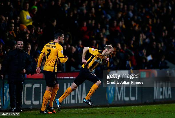 Luke Chadwick of Cambridge United runs on to the pitch as a substitute during the FA Cup Fourth Round match between Cambridge United and Manchester...