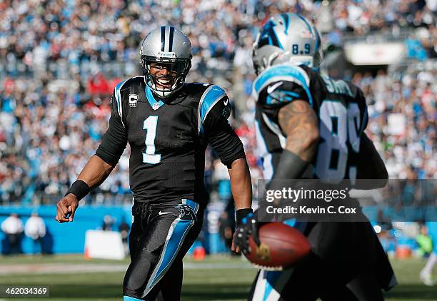 Cam Newton of the Carolina Panthers celebrates with Steve Smith after a touchdown in the second quarter against the San Francisco 49ers during the...