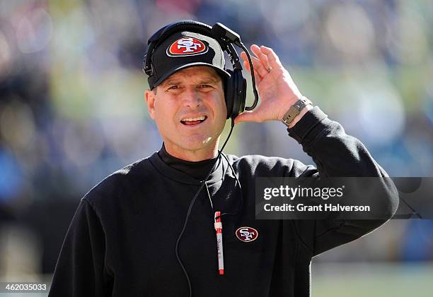 Head coach Jim Harbaugh of the San Francisco 49ers looks ok from the sideline in the second quarter against the Carolina Panthers during the NFC...