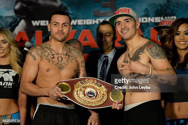 Mike Alvarado and Brandon Rios pose for photos after their weigh in January 23, 2015 at the Tailgate Roadhouse for the upcoming WBO International...