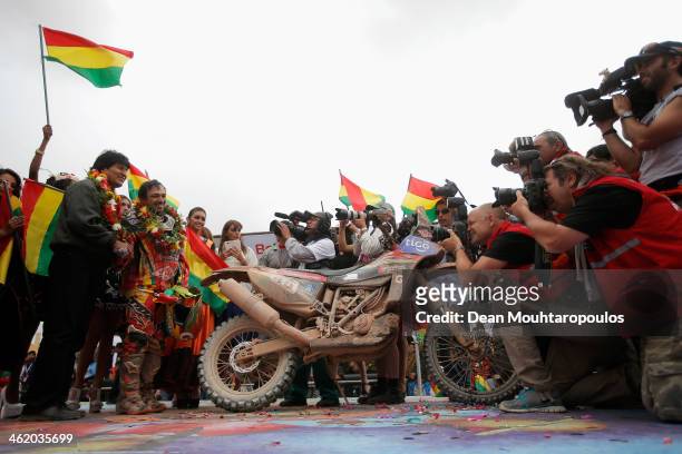 Bolivian President, Evo Morales Ayma shakes the hand of Juan Carlos Salvatierra of Bolivia for Speedbrain Rally Team for the photographers on the...
