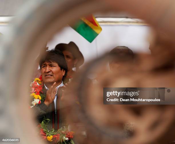Bolivian President, Evo Morales Ayma, applauds the riders on the podium during Day 8 of the 2014 Dakar Rally on January 12, 2014 in Uyuni, Bolivia.