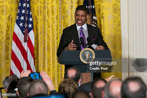 Mayor Kevin Johnson of Sacramento, California introduces U.S. President Barack Obama during an event for the U.S. Conference of Mayors in the East...