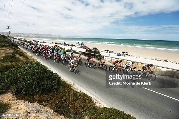 The peleton rides past Aldinga Beach during Stage 5 of the 2015 Santos Tour Down Under on January 24, 2015 in Adelaide, Australia.