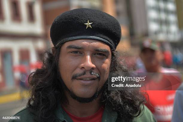 Man impersonates the revolutionary leader Ernesto Che Guevara attends the "March of the Undefeated" commemorating the 57th anniversary of the...