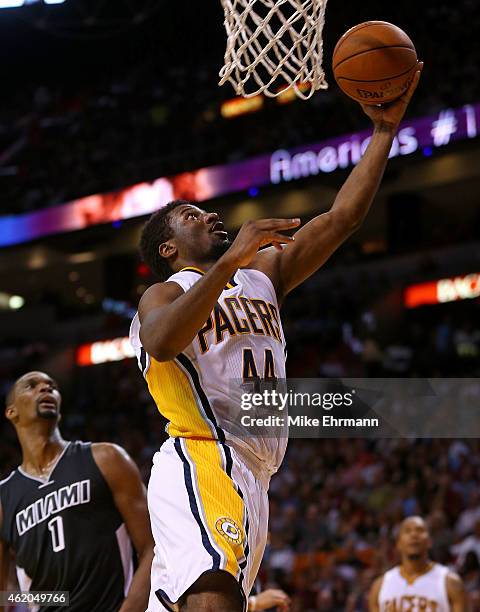 Solomon Hill of the Indiana Pacers drives to the basket during a game against the Miami Heat at American Airlines Arena on January 23, 2015 in Miami,...