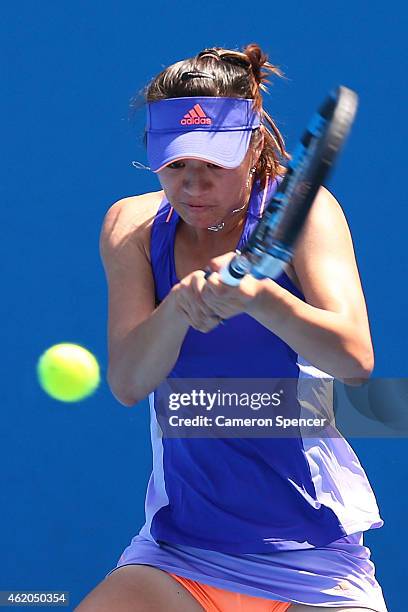 Shilin Xu of China plays a backhand against Kaylah McPhee of Australia during the Australian Open 2015 Junior Championships at Melbourne Park on...