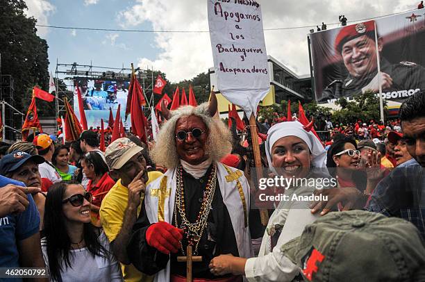 Supporters of Venezuelan President Nicolas Maduro participate in the March of the Undefeated to commemorate the 57th anniversary of the overthrow of...