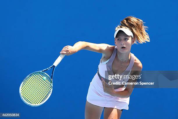 Kaylah McPhee of Australia serves in her match against Shilin Xu of China during the Australian Open 2015 Junior Championships at Melbourne Park on...