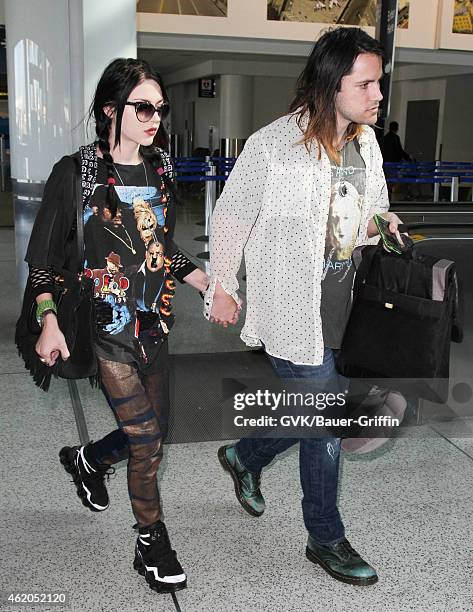 Frances Cobain and Isaiah Silva seen at LAX on January 23, 2015 in Los Angeles, California.