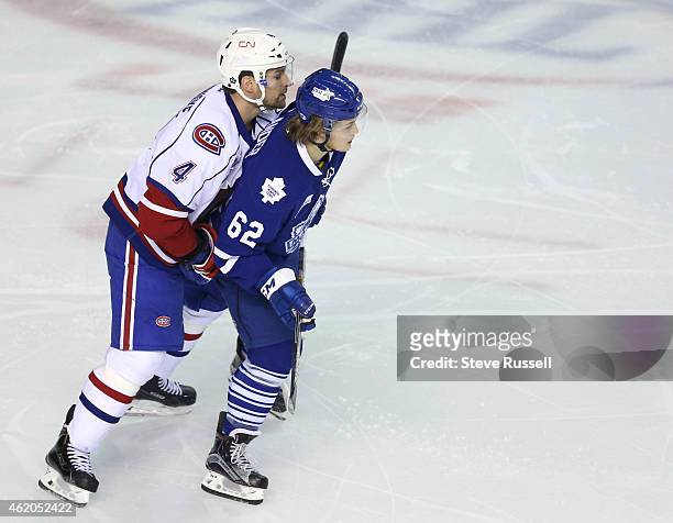 William Nylander is shadowed by Davis Drewiske as the Toronto Marlies lose to the Hamilton Bulldogs 3-0 at the FirstOntario Centre in Hamilton....